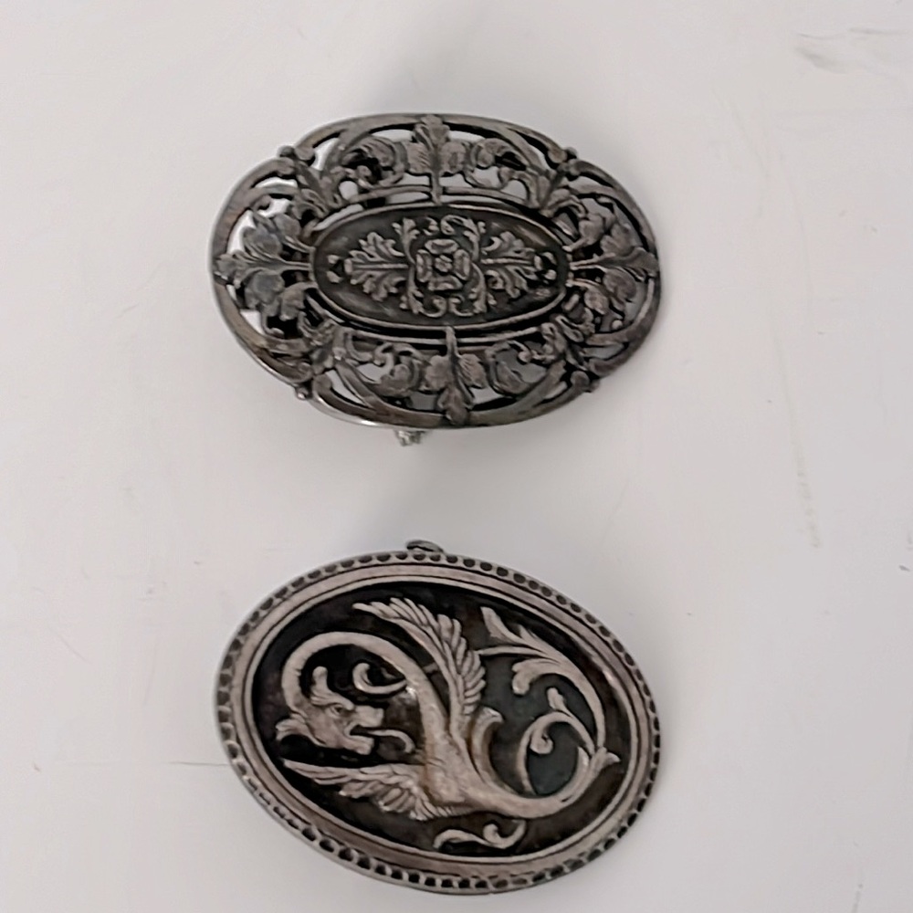 Vintage silver tone clips or pins